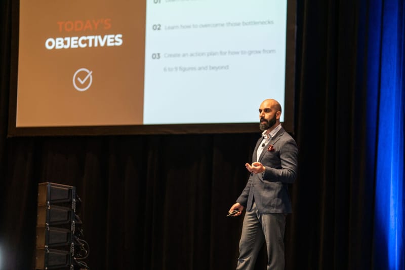 Ayman Al-Abdullah presenting a Today's Objectives slide about growing from six to nine figures